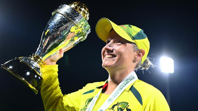 Australia’s Alyssa Healy celebrates with the trophy after Australia won the 2022 ICC Women's Cricket World Cup in Christchurch, New Zealand. Picture: Getty Images