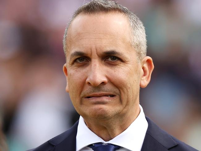 SYDNEY, AUSTRALIA - APRIL 25:  Andrew Abdo the Chief Executive Officer of the National Rugby League pulls a face as he waits to take part in the pre-game ANZAC ceremony before the round seven NRL match between the St George Illawarra Dragons and the Sydney Roosters at Sydney Cricket Ground, on April 25, 2022, in Sydney, Australia. (Photo by Mark Kolbe/Getty Images)