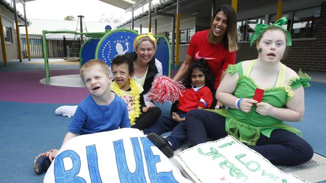 (L-R) Michael Reckless, 7, Carla Boumina, 7, Kirsty Howard, Kingston Perera, 6, Genevieve Grace and Gracie Celona, 16, cheering for their teams at William Rose’s sports day.