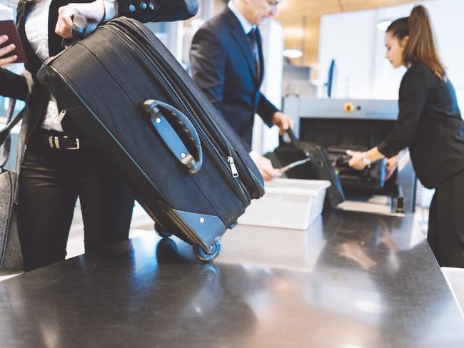 ESCAPE, TECH NEWSPassengers going trough security check at the airport.