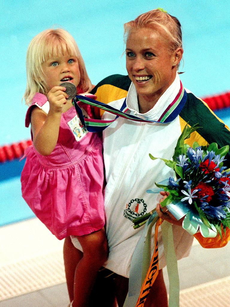 Lisa Curry celebrates with her daughter Jaimi at the 1990 Commonwealth Games. Picture: AAP