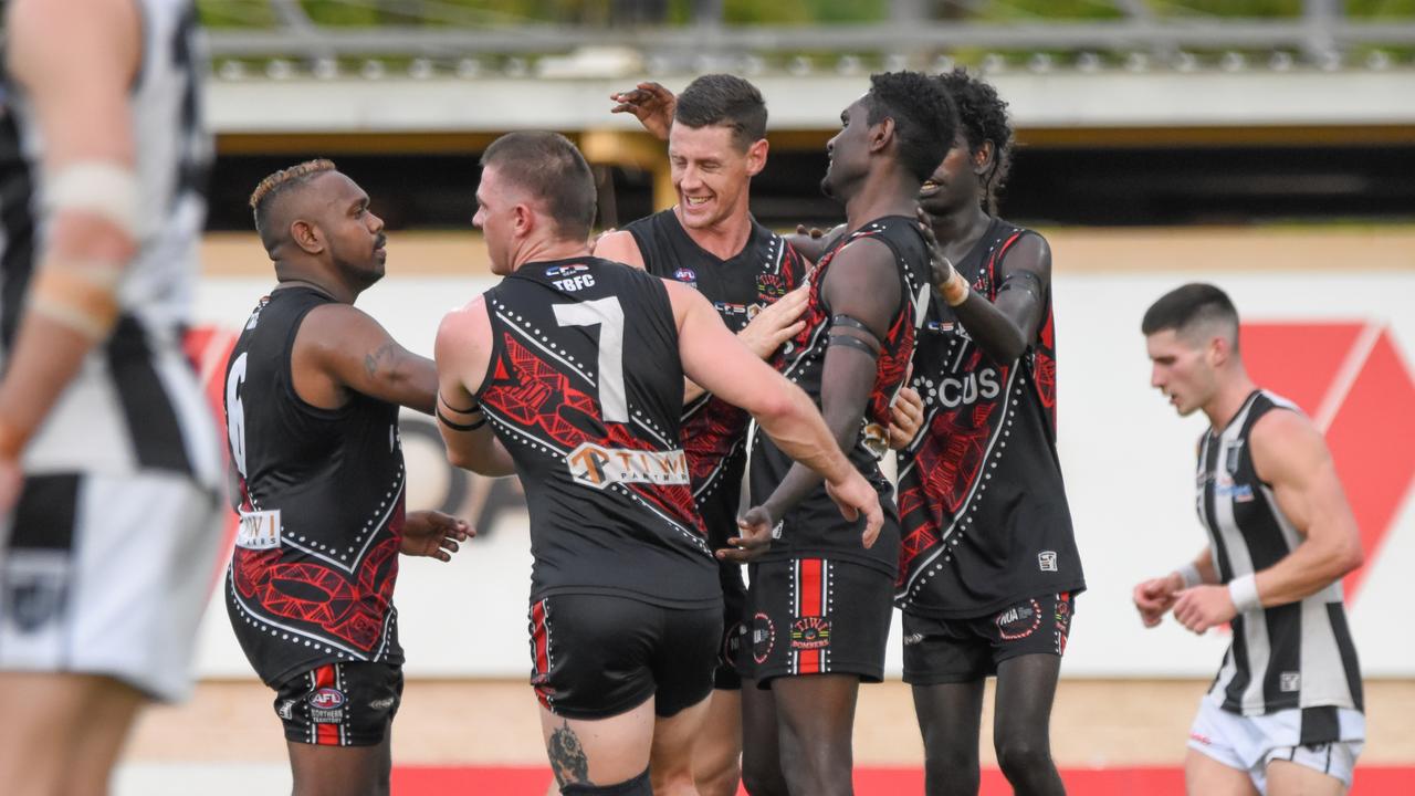 The Tiwi Bombers celebrate a goal against the Palmerston Magpies in Round 12 of the 2023-24 NTFL season. Picture: Tymunna Clements