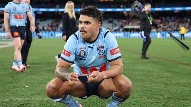 MELBOURNE, AUSTRALIA - JUNE 26:  Latrell Mitchell of the Blues reacts after winning game two of the men's State of Origin series between New South Wales Blues and Queensland Maroons at the Melbourne Cricket Ground on June 26, 2024 in Melbourne, Australia. (Photo by Cameron Spencer/Getty Images)