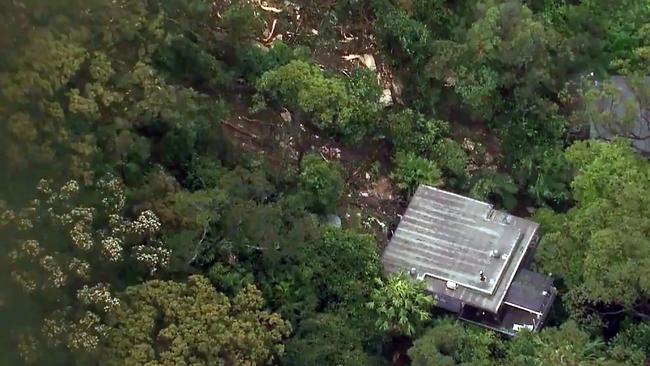 The wet weather has triggered a landslide on the northern beaches. Picture: 9News