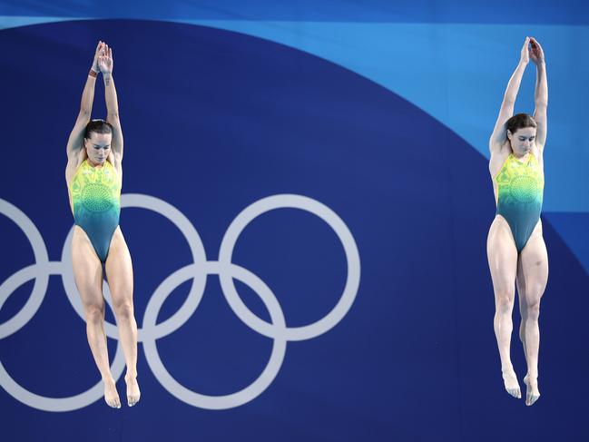 PARIS, FRANCE - JULY 27: Maddison Keeney and Anabelle Smith of Team Australia compete in the Women's Synchronised 3m Springboard Final on day one of the Olympic Games Paris 2024 at Aquatics Centre on July 27, 2024 in Paris, France. (Photo by Sarah Stier/Getty Images)