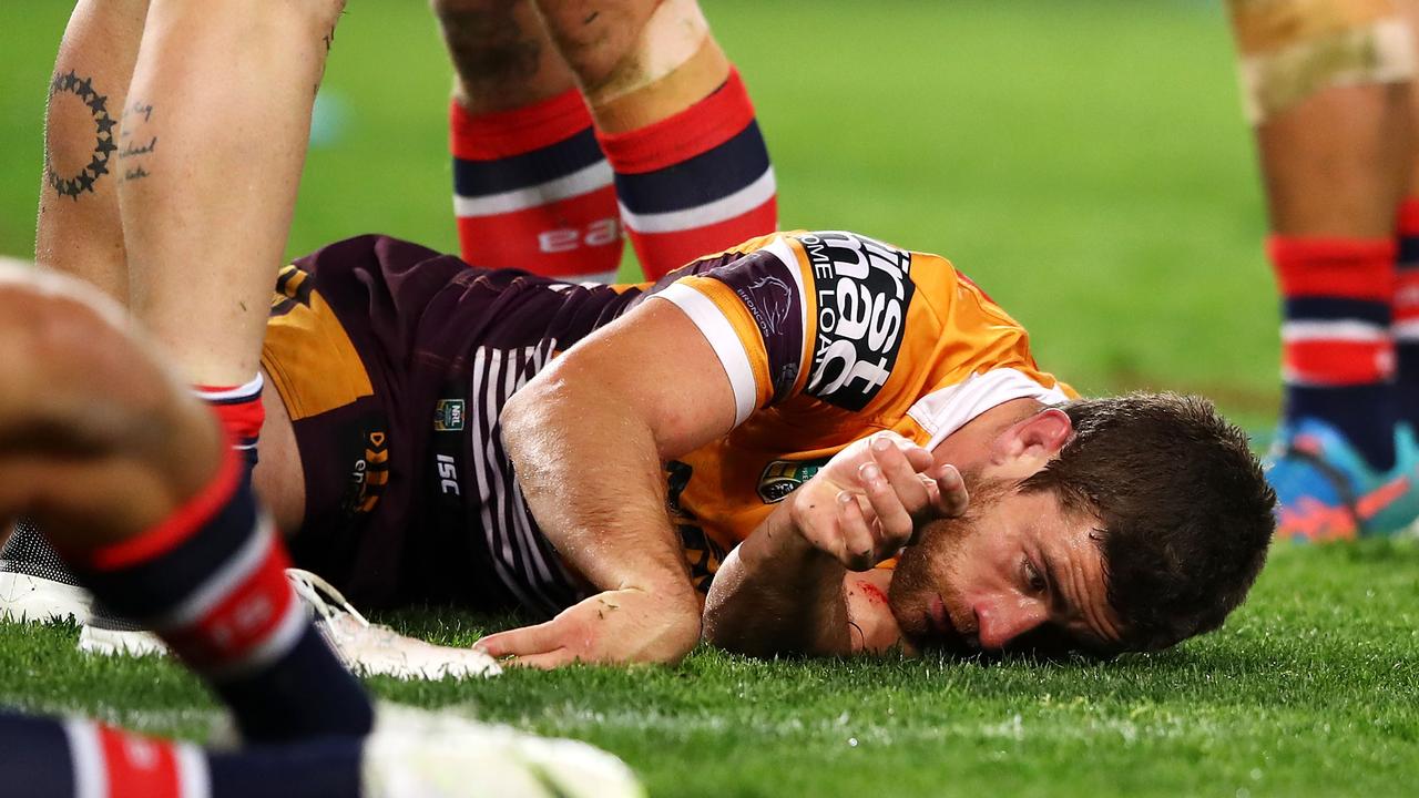 Andrew McCullough of the Broncos lies unconscious following the ugly Dylan Napa collision.