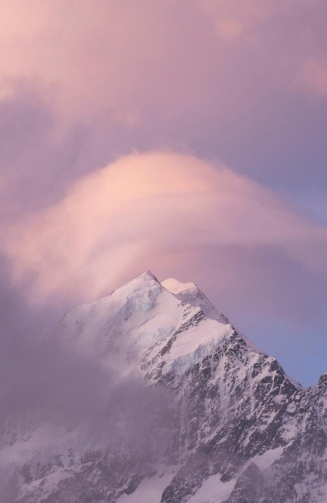 At New Zealand’s Mount Cook/Aoraki, a brief burst of pink light breaks through the clouds, offering a fleeting but awe-inspiring glimpse of nature’s unpredictable beauty. This ethereal shot was captured by Australian photographer, Lisa Michele Burns, who focuses on glaciers, deserts and other regions of climatic significance. Picture: Lisa Michele Burns/Vital Impacts