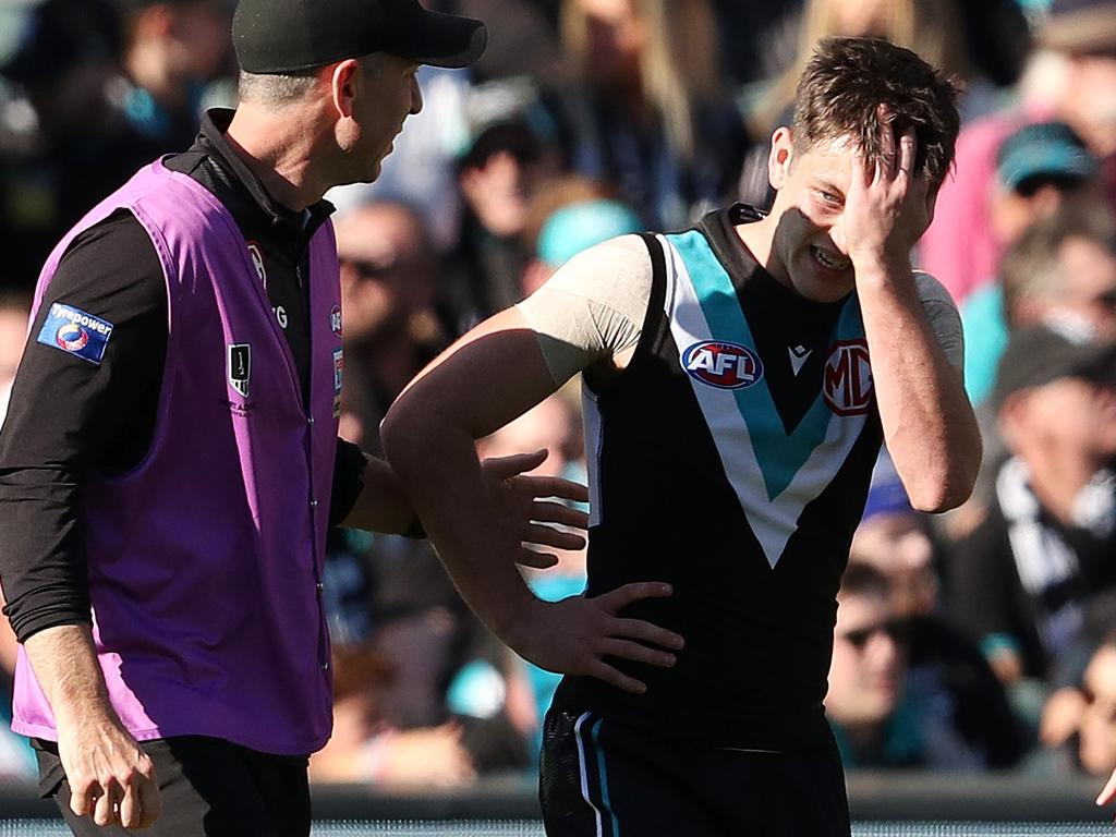 Zak Butters’ disappointment is obvious after he suffered a painful knee injury. Picture: AFL Photos via Getty Images