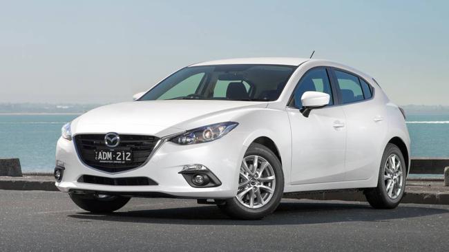 Arch rivals ... The latest 2015 Mazda3 hatch and main opponent of the Toyota Corolla. Picture: Supplied