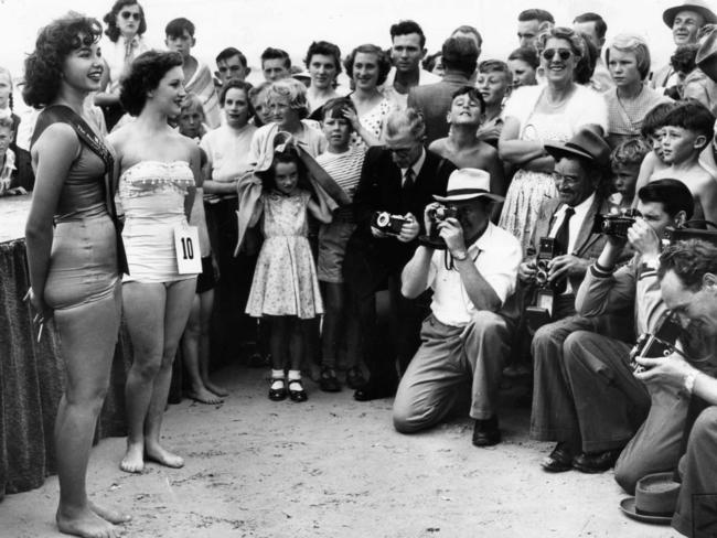 Winner of another Sunday Advertiser Beach Girl Quest, is ‘Miss Glenelg’ — Baruta Hagenfelds — and second-placed Yvonne Cleeve, circa 1950s.