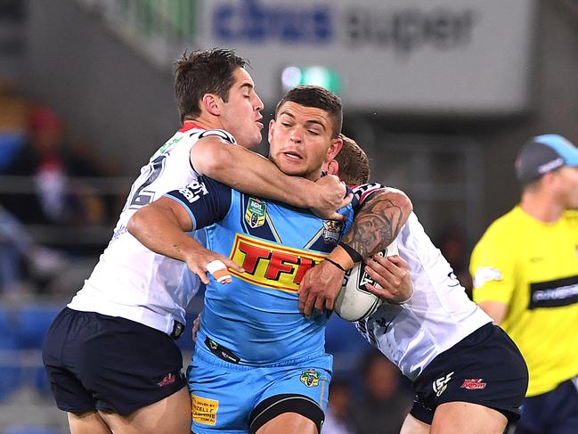 Ashley Taylor of the Titans takes the ball up during the Round 18 NRL match between the Gold Coast Titans and the Sydney Roosters at Cbus Super Stadium on the Gold Coast, Sunday, July 15, 2018. (AAP Image/Dave Hunt) NO ARCHIVING, EDITORIAL USE ONLY