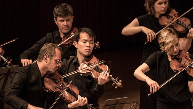 Richard Tognetti, bottom left, with members of the Australian Chamber Orchestra