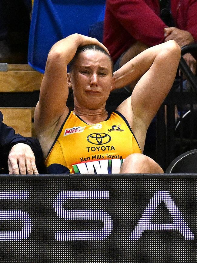 Mahalia Cassidy of the Lightning looks dejected after leaving the court injured against the Mavericks. Photo: Bradley Kanaris/Getty Images