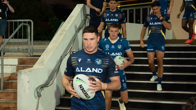 Mitchell Moses leads out the Eels against the Broncos at TIO Stadium. Picture: Pema Tamang Pakhrin