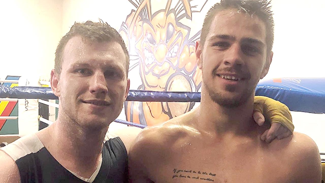 Benjamin Hussain (right) after a sparring session with former world champion Jeff Horn. Photo: Contributed