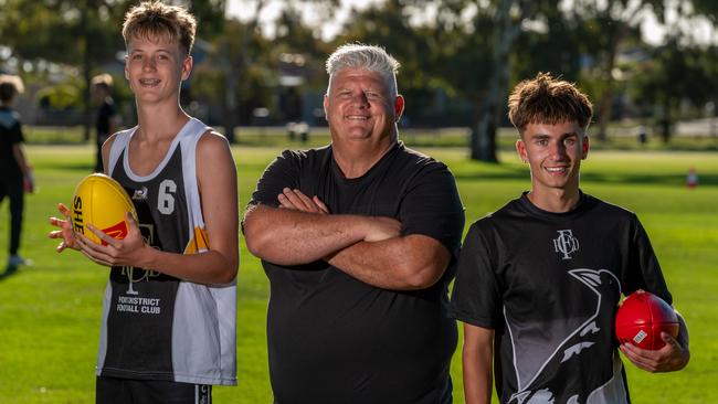 Port District Junior Football Club president Andrew Marks is an advocate of the new concussion policy. He’s pictured here with U16 players Jaxon Lynch and Christian Smith. Picture: Naomi Jellicoe