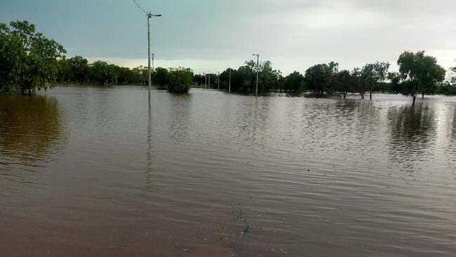 The Waterhouse River has broken its banks, flooding Beswick (Wugularr) in the aftermath to Cyclone Tiffany crossing the coast on Wednesday. Picture: Supplied