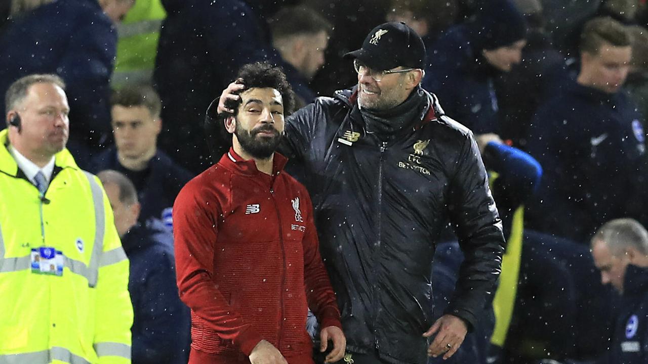 Liverpool manager Jurgen Klopp, right, and Mohamed Salah celebrate