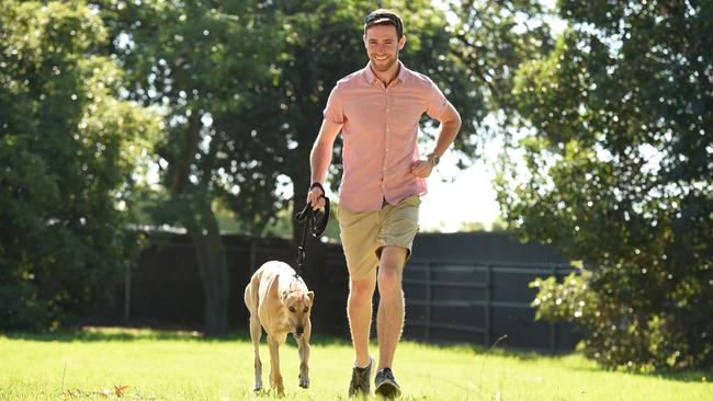 Henry Paulet with his dog Baxter. Picture: David Smith