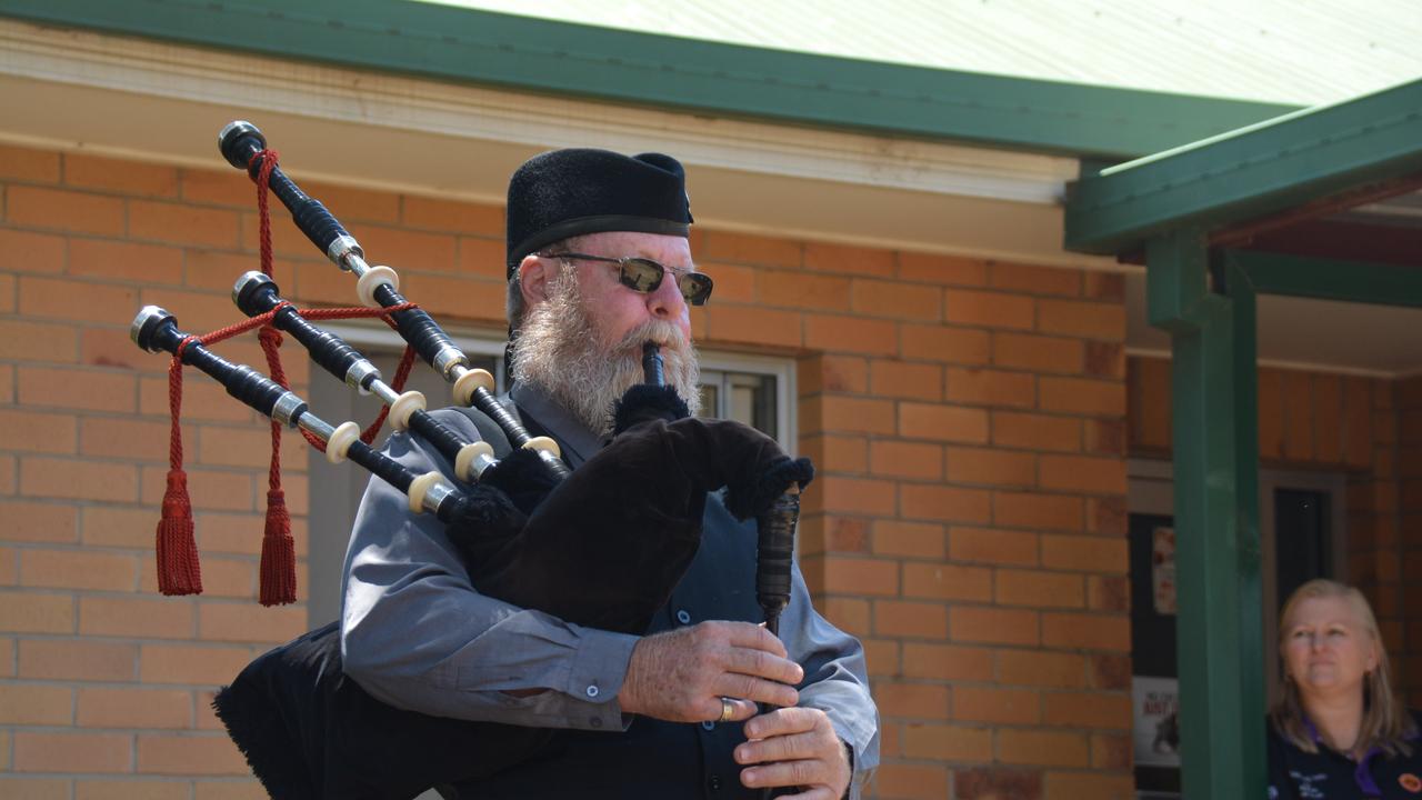 Pipe Major Ross Page plays the Pipers' lament during the wreath laying ceremony at the 2019 Kingaroy Remembrance Day service at KSHS. (Photo: Jessica McGrath)