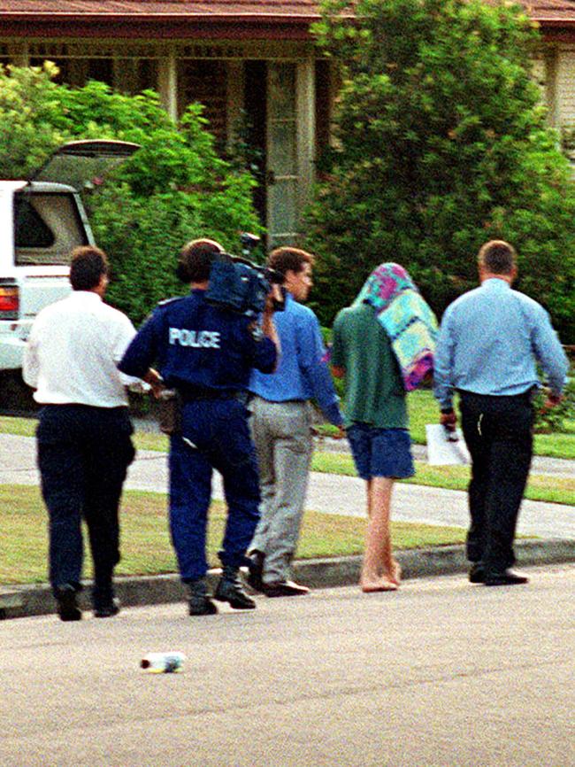 SLR being arrested by police.