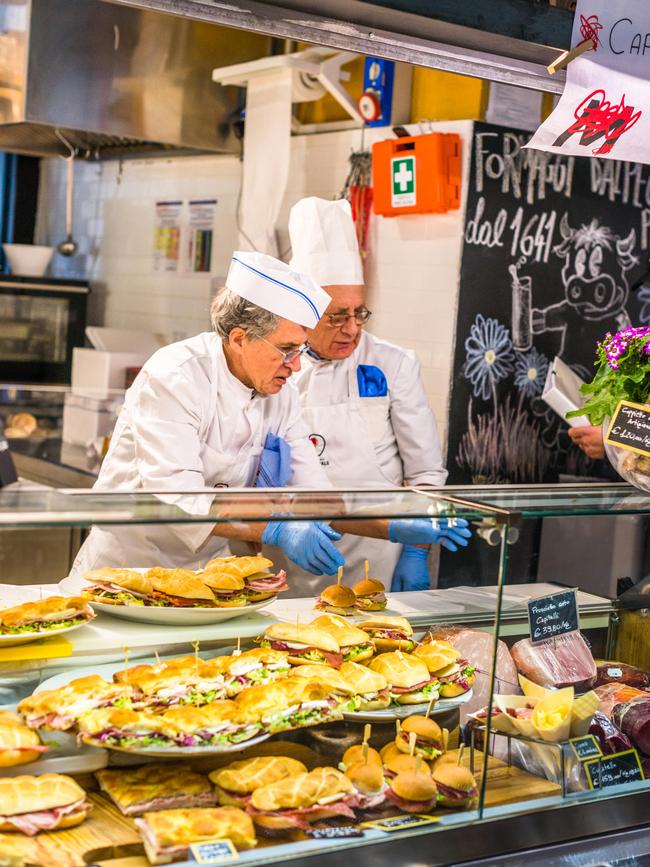 Serving sandwiches at Mercato Centrale Roma.