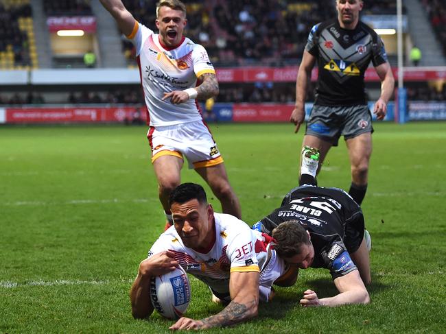 Israel Folau scores a try with his first touch of the football for Catalans Dragons. Picture: Getty