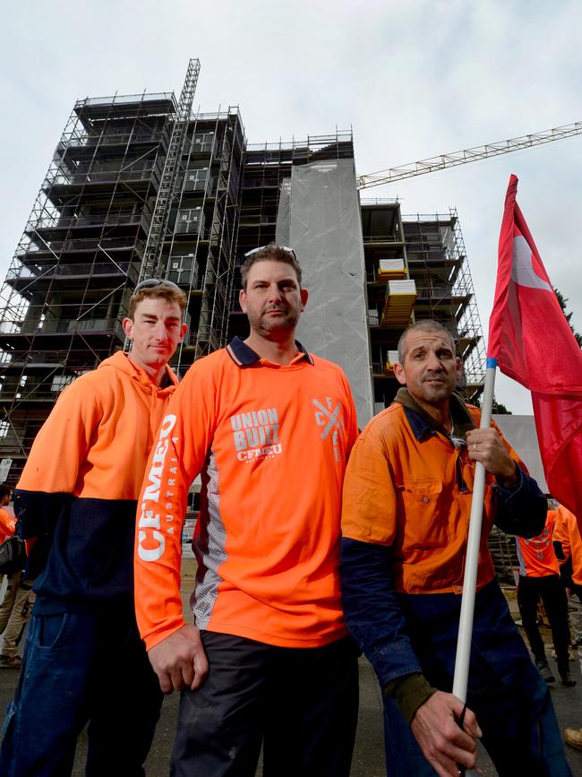 Core-Form director Andrew Sneath, centre, with workers Alex Creek and Paul Niblock. Picture: AAP / Sam Wundke