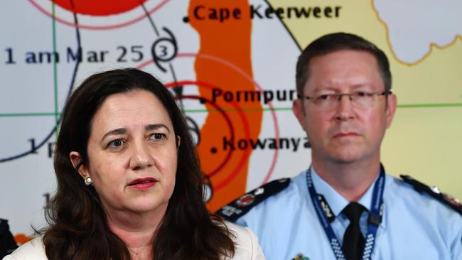 “I can’t describe the emotions I get every time a cyclone is about to cross the Queensland coast,’’ says Premier, Annastacia Palaszczuk. Above the Premier at a briefing for Cyclone Nora. Photo: AAP/Darren England