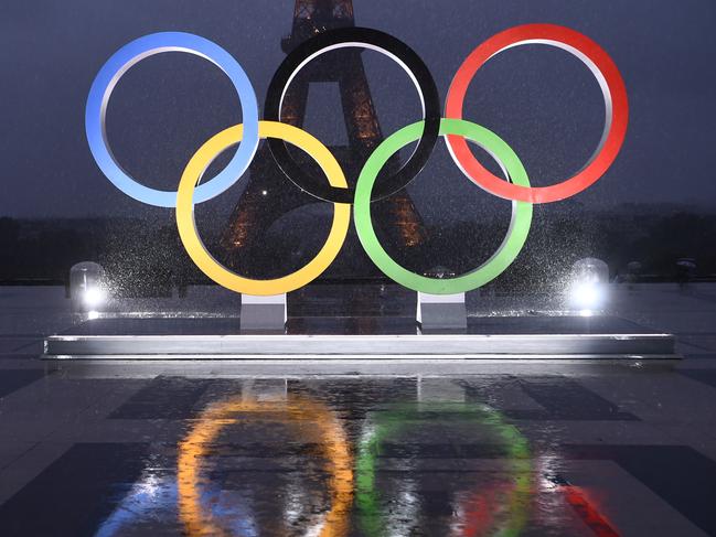 A picture shows the Olympics Rings on the Trocadero  Esplanade near the Eiffel Tower in Paris, on September 13, 2017, after the  International Olympic Committee named Paris host city of the 2024 Summer Olympic Games. The International Olympic Committee named Paris and Los Angeles as hosts for the 2024 and 2028 Olympics on September 13, 2017, crowning two cities at the same time in a historic first for the embattled sports body. / AFP PHOTO / CHRISTOPHE SIMON