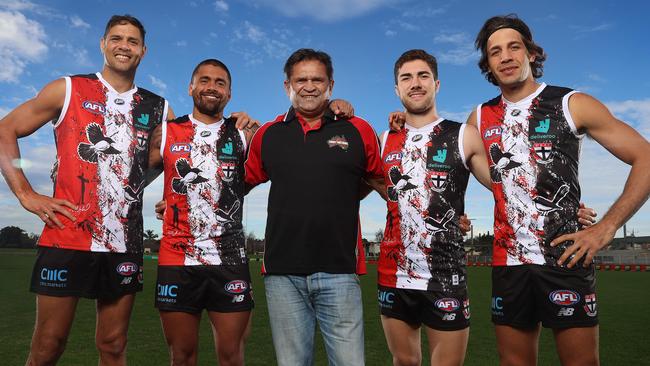 St Kilda great and Indigenous jumper designer Nicky Winmar with (from left) Saints stars Paddy Ryder, Brad Hill, Jade Gresham and Ben Long. Picture: Michael Klein