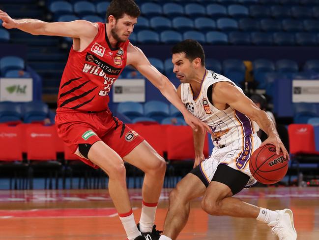 The Kings’ Kevin Lisch looks to get past Clint Steindl of the Wildcats on Friday night. Picture: Getty Images