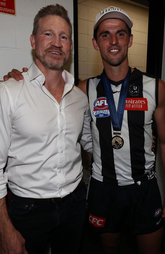 Nathan Buckley poses with Scott Pendlebury in the rooms after the grand final. Picture: Michael Klein