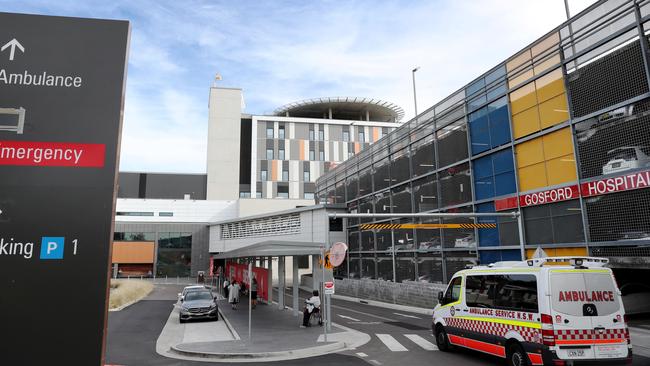 A nurse at Gosford Hospital said the masks smelled like petroleum or diesel. Picture: AAP/Sue Graham