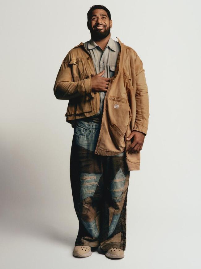 Jordan Mailata wears canvas wading jacket, country utility jacket, both by Polo Ralph Lauren; denim jacket, and jeans, both by Acne Studios; shoes Mailata’s own