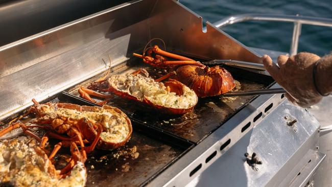 Crays on the barbecue of Rottnest Cruises.