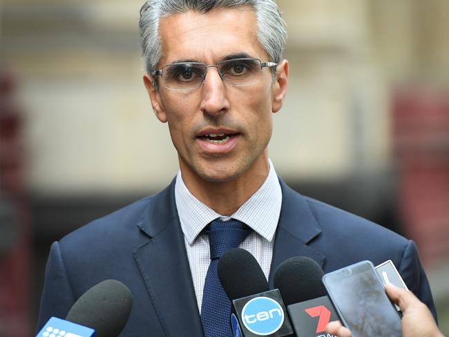 Hugh de Kretser from the Human Rights Centre speaks outside the Supreme Court in Melbourne. Picture: AAP Image/Julian Smith