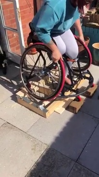 Dad's Roller System Allows Wheelchair Athlete Daughter to Train at Home