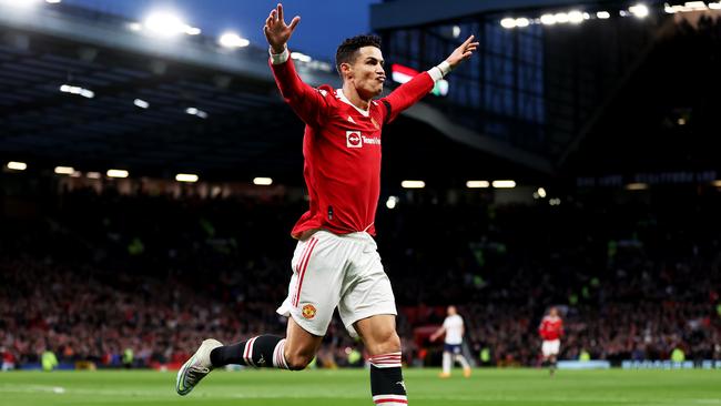 MANCHESTER, ENGLAND - MARCH 12: Cristiano Ronaldo of Manchester United celebrates after scoring their side's second goal during the Premier League match between Manchester United and Tottenham Hotspur at Old Trafford on March 12, 2022 in Manchester, England. (Photo by Naomi Baker/Getty Images) *** BESTPIX ***