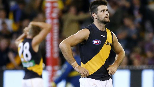 Trent Cotchin tries to figure out how Richmond lost to Collingwood. Picture: Colleen Petch