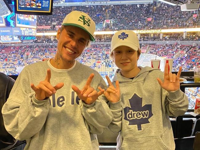 Justin and Jaxon at ice hockey game in 2023. Picture: Instagram