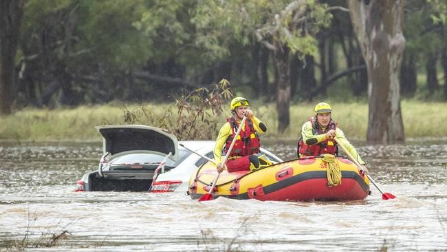 A swiftwater rescue at Fairney View, near Fernvale on Friday. Picture: Richard Walker