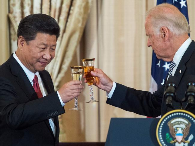 Joe Biden and Xi Jinping drink a toast during a State Luncheon for China at the State Department in Washington in 2015. Picture: AFP