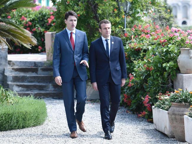 As this picture of Canadian Prime Minister Justin Trudeau and French President Emmanuel Macron shows, centrists are annoying but good at winning elections. Picture: Stephane De Sakutin