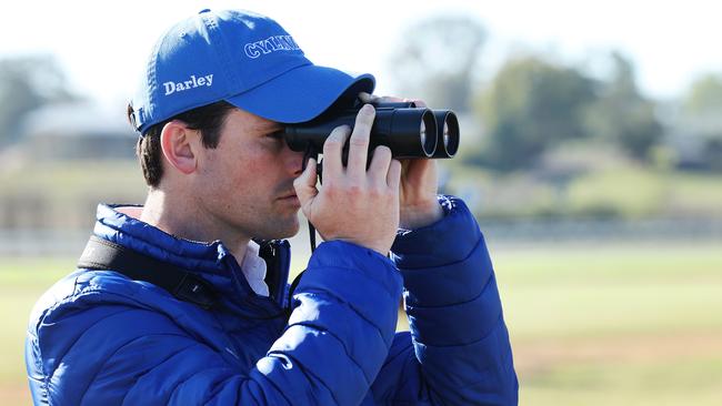 Godolphin trainer James Cummings monitors his all-star team during early-morning trackwork at the picturesque riverside private training facility at Agnes Banks near Richmond. Pictures: Rohan Kelly