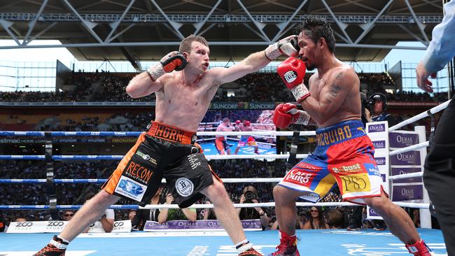 Jeff Horn connects with Manny Pacquiao at Suncorp Stadium. Picture: Peter Wallis