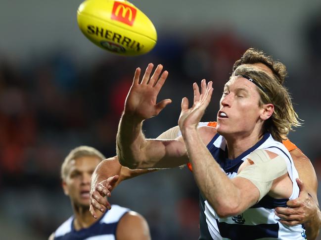 Blicavs takes front position ahead of Braydon Preuss. Picture: Mark Metcalfe/AFL Photos/via Getty Images