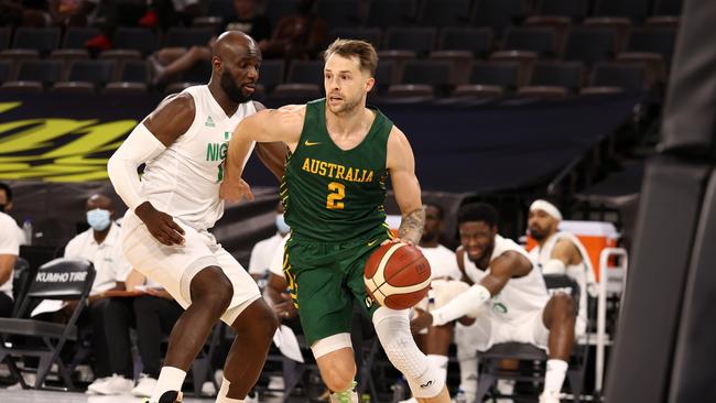 LAS VEGAS, NV - JULY 13: Nathan Sobey #2 of the Australia Men's National Team drives to the basket against the Nigeria Men's National Team on July 13, 2021 Michelob ULTRA Arena in Las Vegas, Nevada. NOTE TO USER: User expressly acknowledges and agrees that, by downloading and or using this Photograph, user is consenting to the terms and conditions of the Getty Images License Agreement. Mandatory Copyright Notice: Copyright 2021 NBAE (Photo by Stephen Gosling/NBAE via Getty Images)