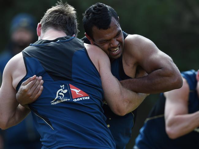 Rob Horne and Kurtley Beale during a wrestling drill.