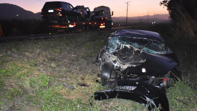 Tragic scenes at a fatal crash on the Bruce Highway near Pindi Pindi. Picture: Lillian Watkins